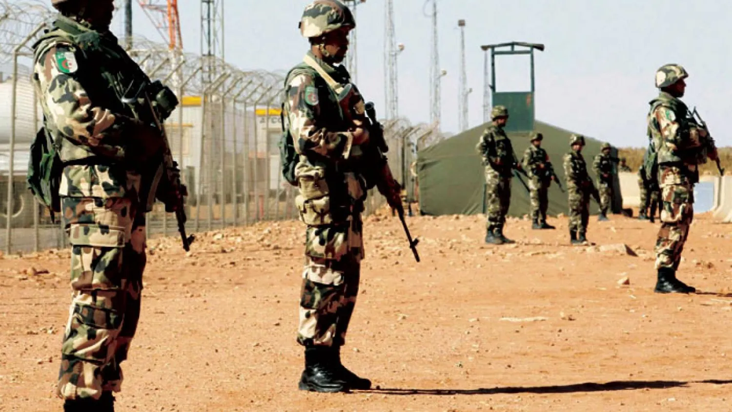A 2013 file picture shows Algerian soldiers standing guard 1,600 km southeast of Algiers. (Reuters)
