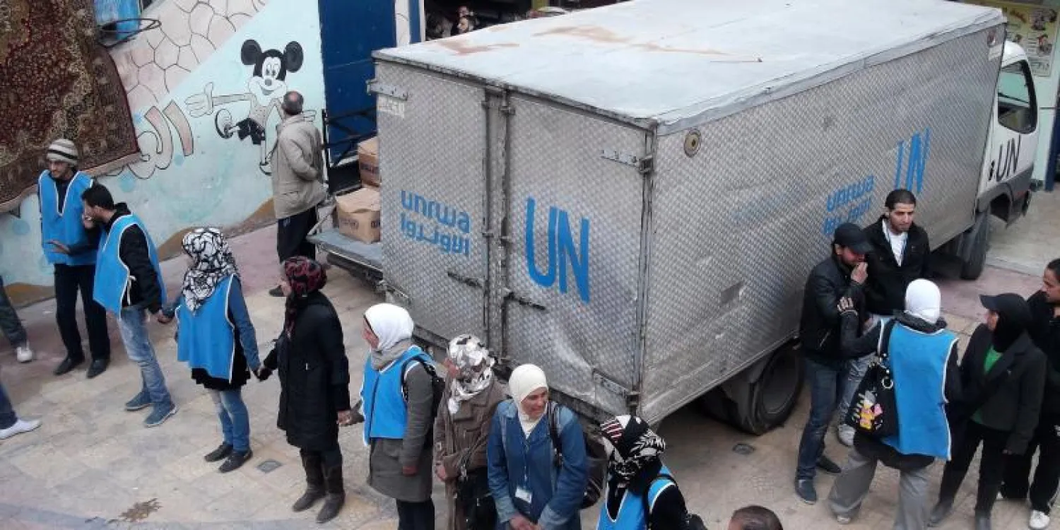 مساعدات تقدمها «الأونروا» للاجئي فلسطين في سوريا (رويترز)