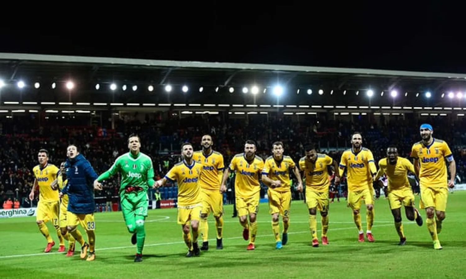  Juventus players celebrate after beating Cagliari at the Sardegna Arena. Photograph: Miguel Medina/AFP/Getty Images
