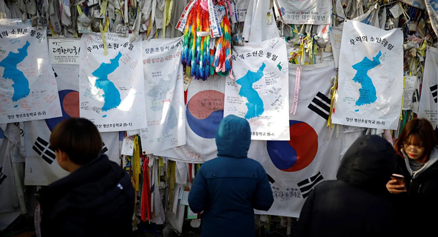 Unification flags hang on a military fence near the demilitarized zone separating the two Koreas in Paju, South Korea. (Reuters)