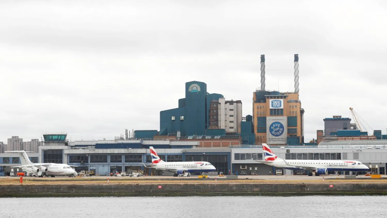 FILE PHOTO: Aircraft stand idle at City Airport after a protest closed the runway causing flights to be delayed, in London, Britain September 6, 2016.