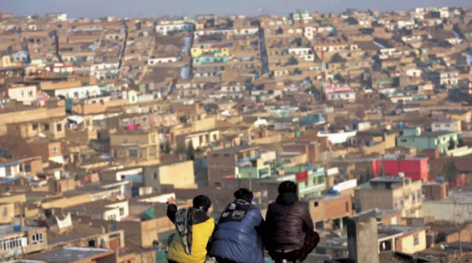 Afghans look over Kabul in January. (Rahmat Gul/AP)
