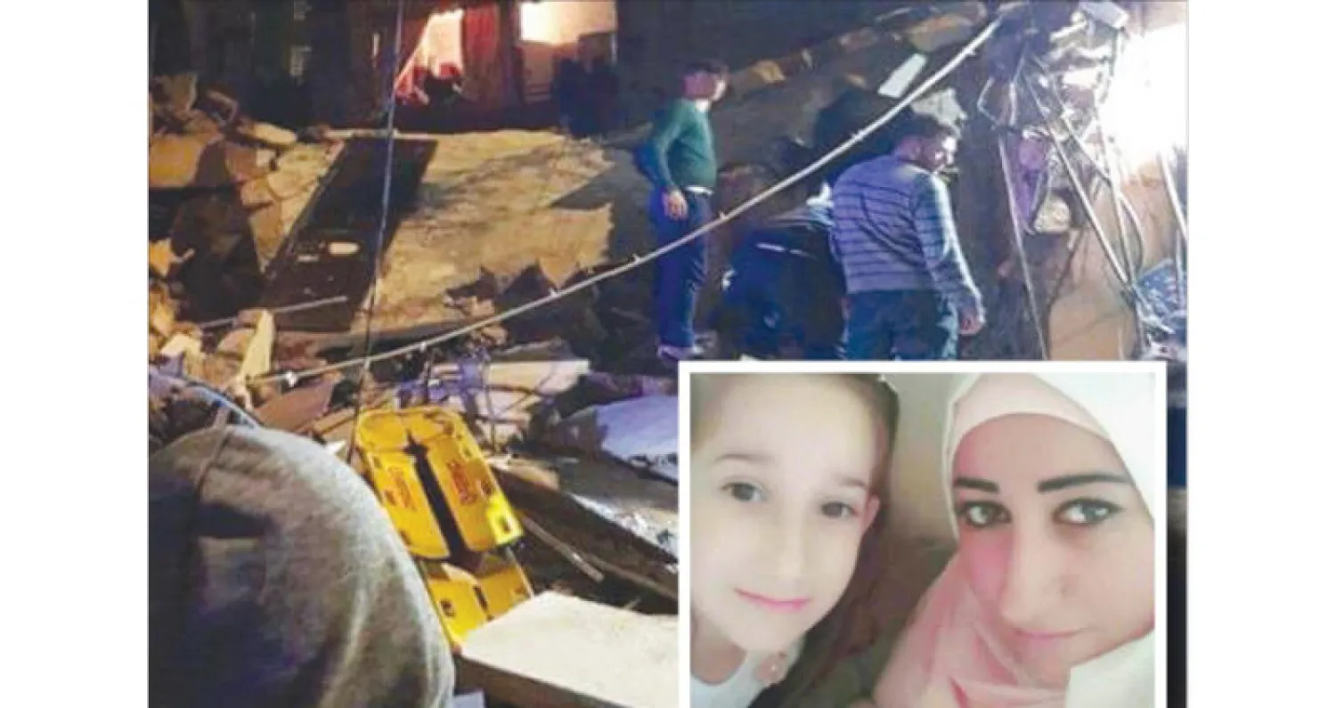 صورة للمبنى المنهار في الضاحية جنوب بيروت أمس تناقلتها  وسائل التواصل.. وفي الإطار امرأة وابنتها ضحيتا الانهيار