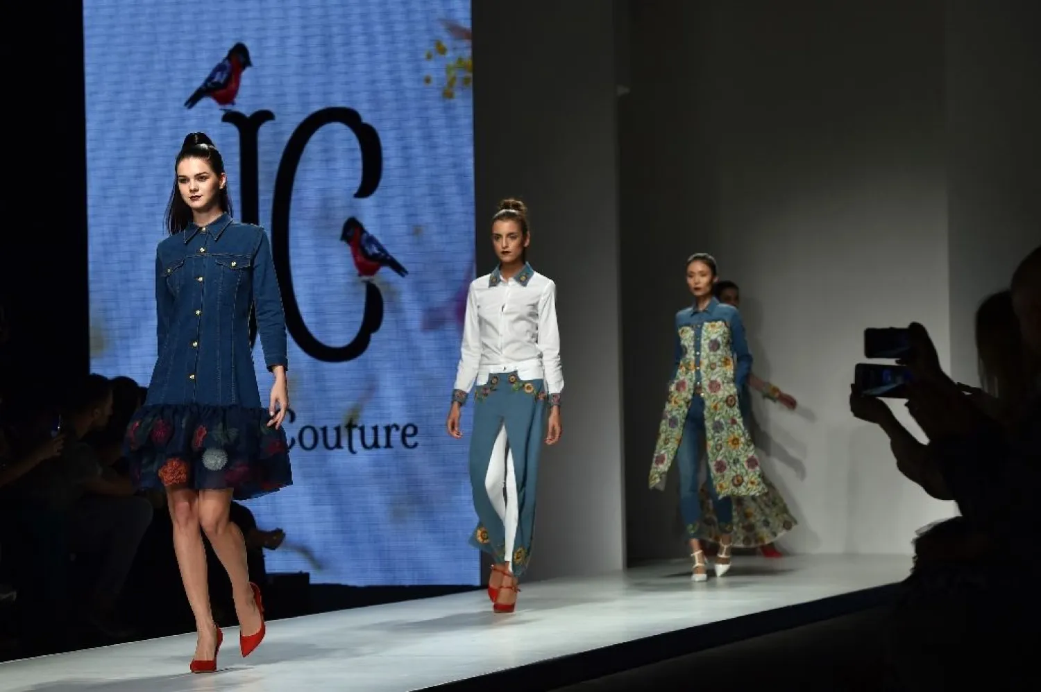 Models present creations by Saudi Arabia's Suzan Farhoud and Leen Al-Shishakly during the Arab Fashion Week in 2016 in Dubai. (AFP)