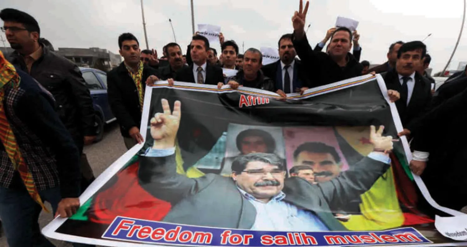 أكراد يتظاهرون في أربيل تضامناً مع صالح مسلم أمس (أ.ف.ب)