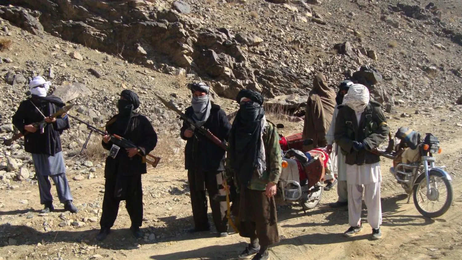 Taliban fighters on patrol in January 2010. AFP file photo