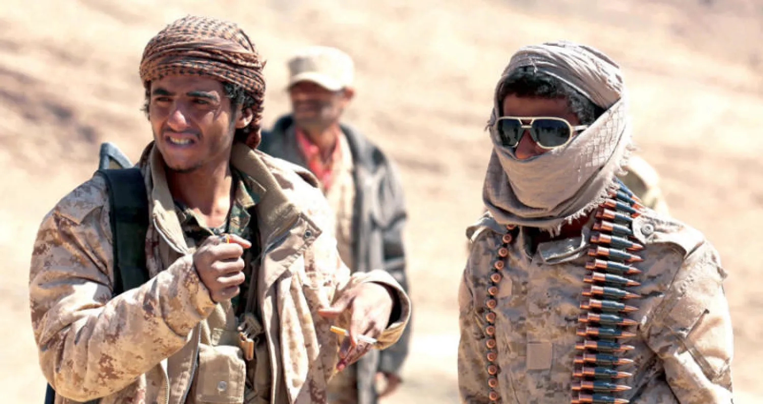 عناصر من لجان المقاومة الشعبية المؤيدة للشرعية في اليمن (أ.ف.ب)