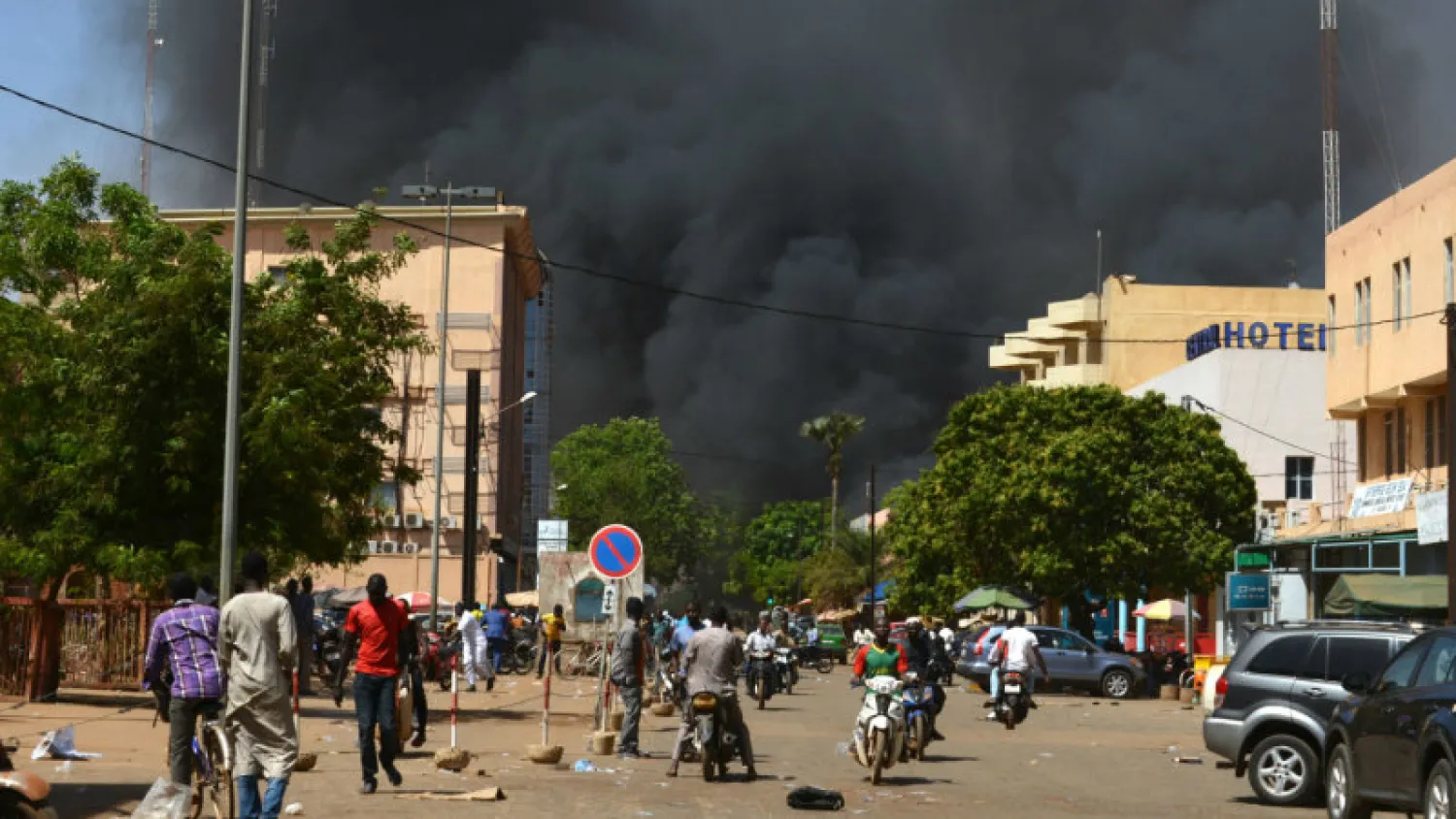 Black smoke billows above downtown Ouagadougou. Ahmed Ouoba/AFP