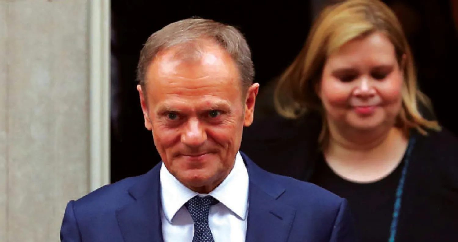 رئيس المجلس الأوروبي دونالد توسك لدى مغادرته داونينغ ستريت يوم الخميس (أ.ف.ب)