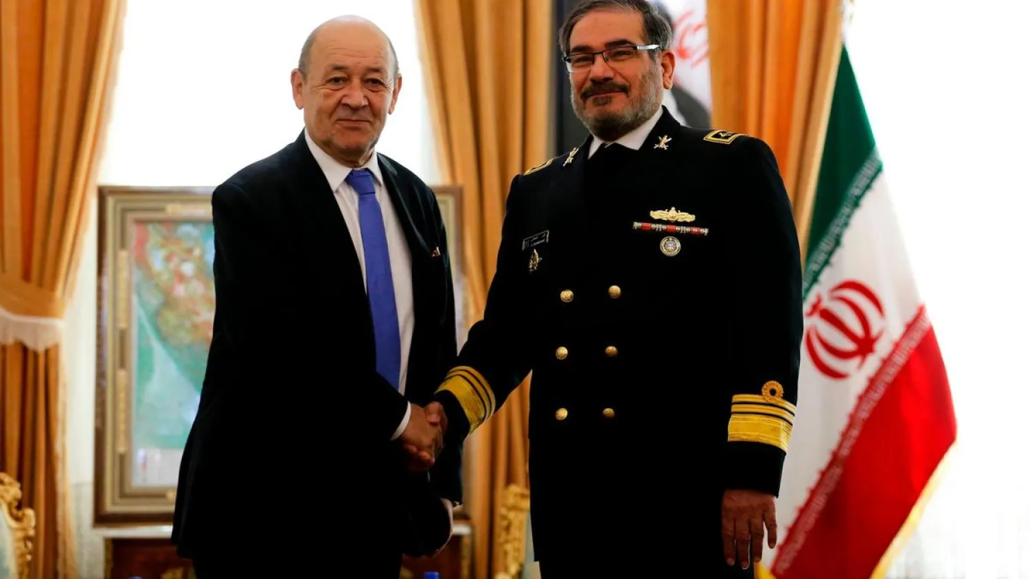 Iranian Foreign Minister Mohammad Javad Zarif greets his French counterpart Jean-Yves Le Drian in Tehran on March 5, 2018.  Reuters