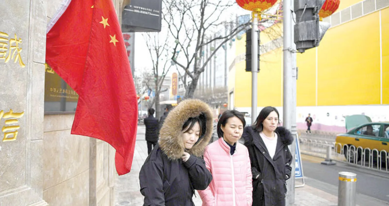 أقرت الصين مؤخراً قانونا جديدا للموازنة وإجراءات أخرى لاحقة لضبط الوضع المالي (أ.ف.ب)