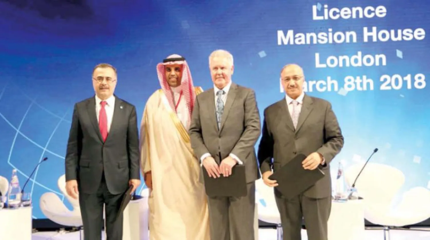 President and CEO of Saudi Aramco Amin H. Al-Nasser, SABIC Vice Chairman and CEO, Mr. Yousef Al Benyan and two officials from Wood following the awarding ceremony (Asharq Al-Awsat)