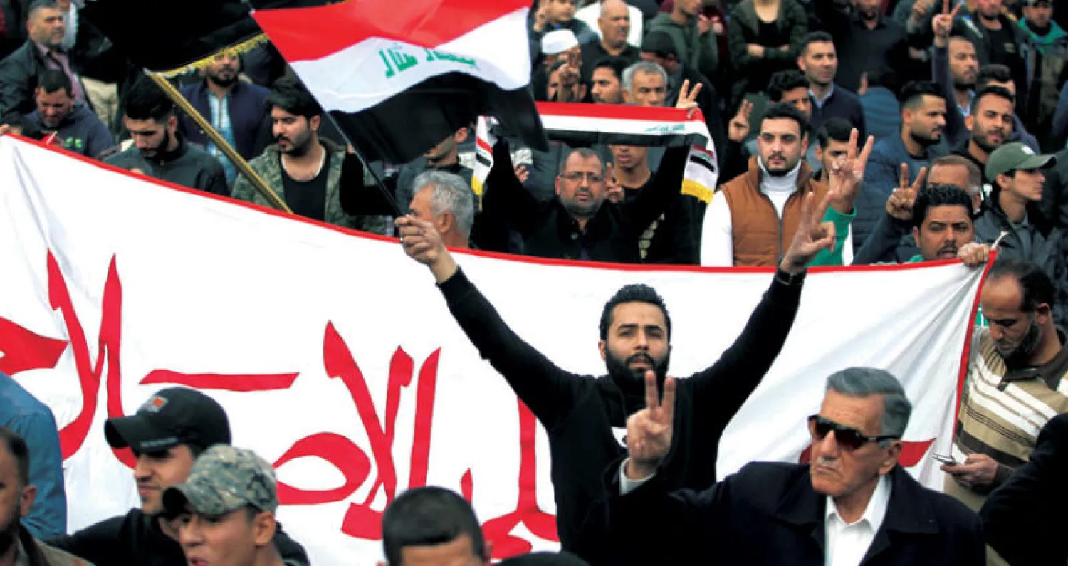 متظاهرون  يطالبون بالإصلاح في بغداد الجمعة الماضي (أ.ف.ب)