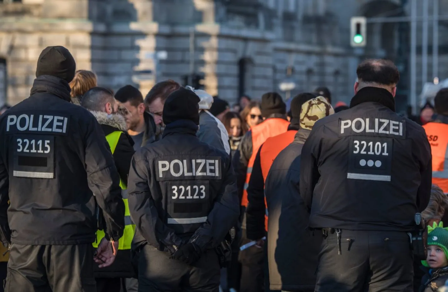 German police officers watch over a security check near Berlin's Brandenburg Gate. (AFP)