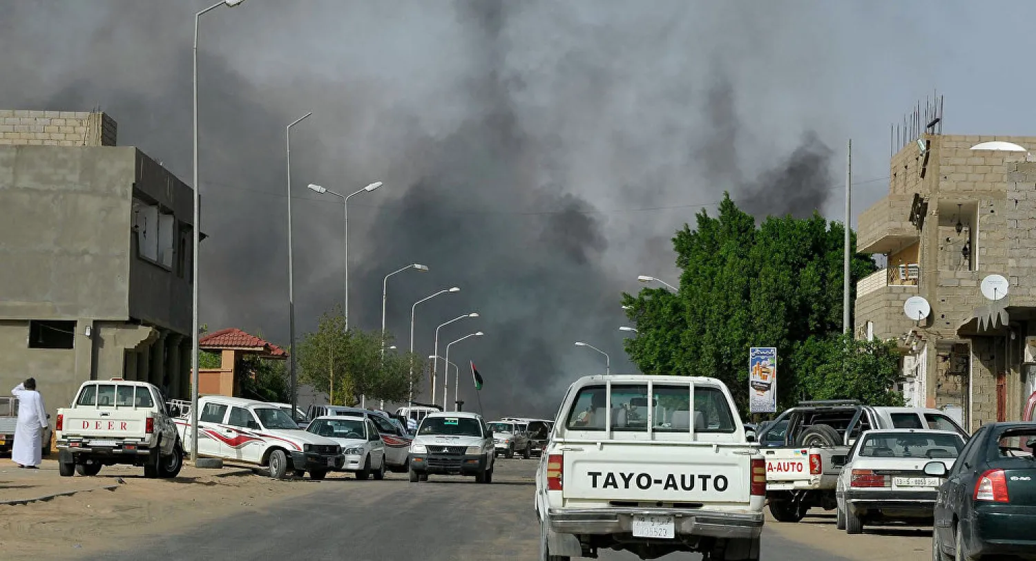 Smoke rising in Sabha, South Libya (AFP 2018/ STR)
