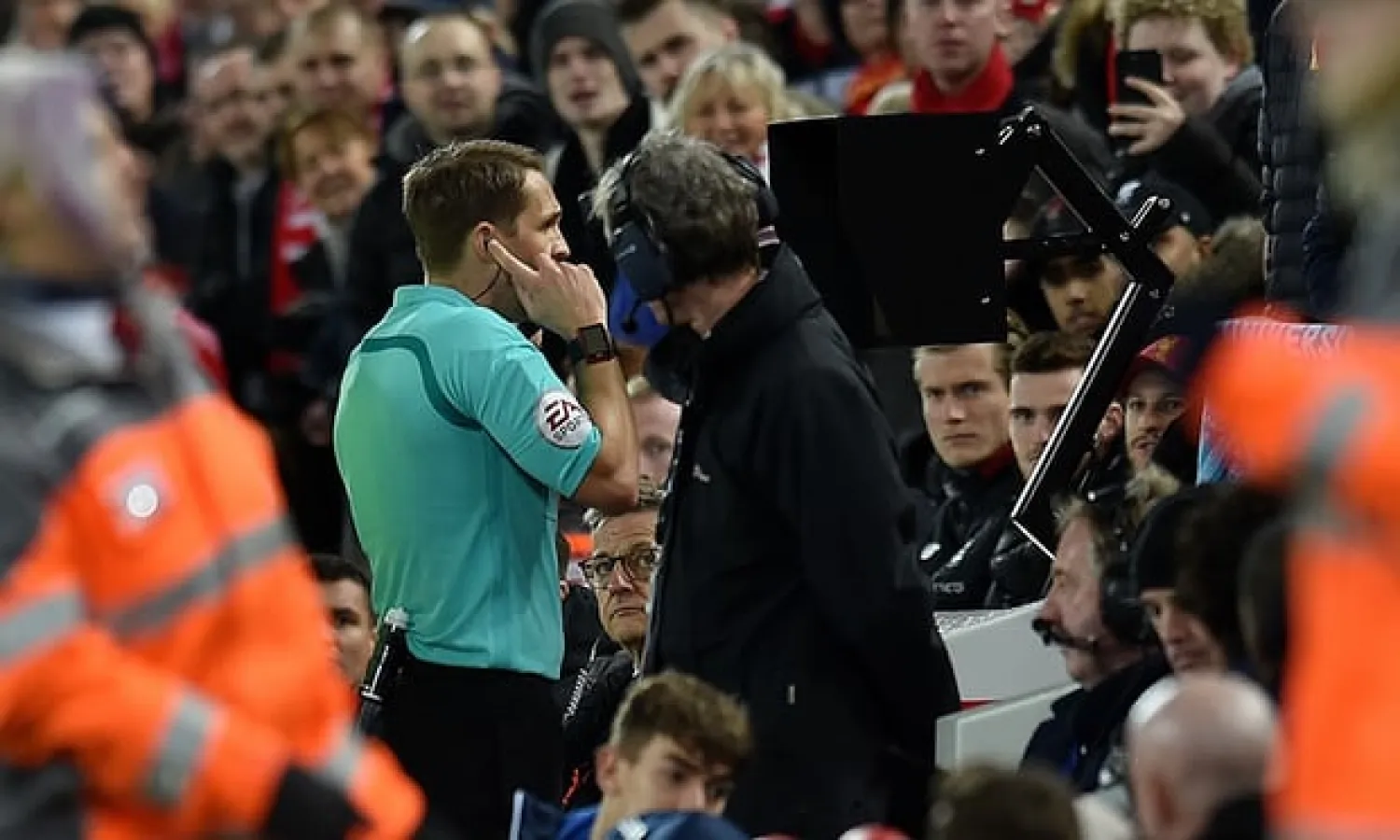  Craig Pawson consults the VAR system during January’s FA Cup fourth round match between Liverpool and West Bromwich Albion at Anfield. Photograph: Andrew Powell/Liverpool FC via Getty Images
