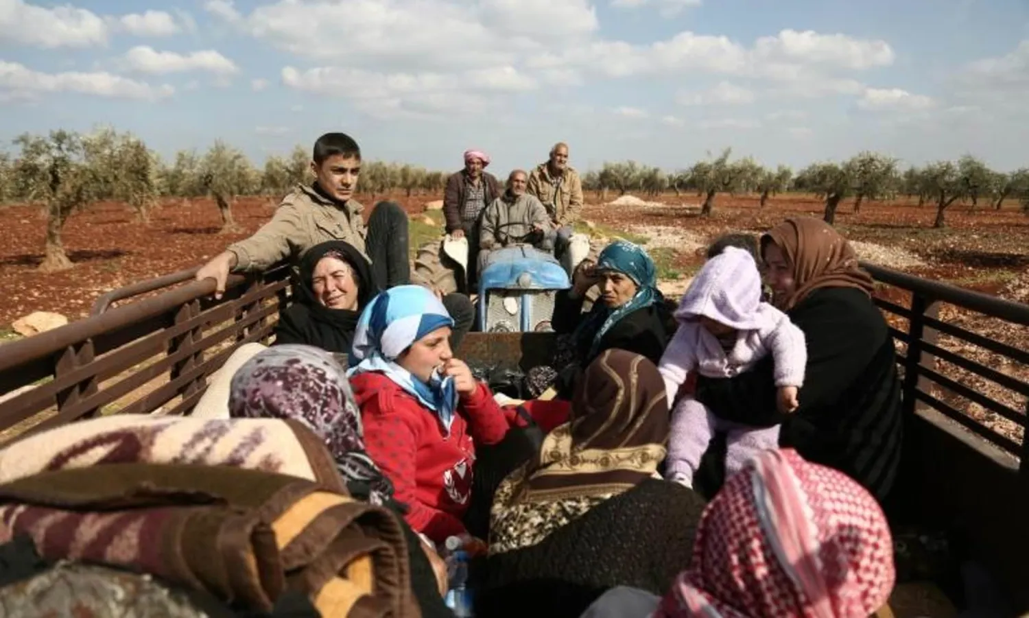 Syrian civilians flee Afrin in northern Syria on March 13, 2018. AFP