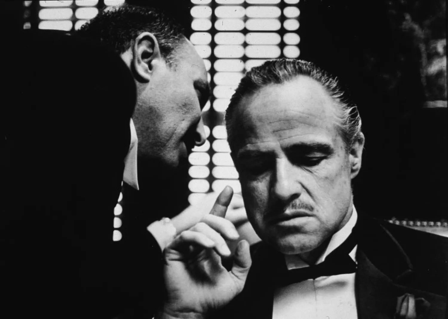 American actor Marlon Brando listens as an unidentified actor
speaks close to one ear in a still from the film, 'The Godfather,'
directed by Francis Coppola, 1972 Paramount Pictures—Getty Images