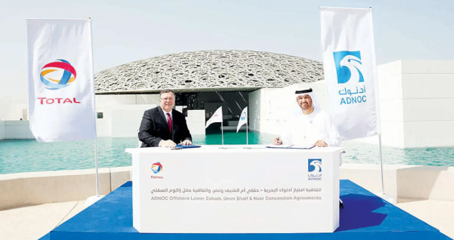 الجابر وبويان خلال توقيع الاتفاقية («الشرق الأوسط»)