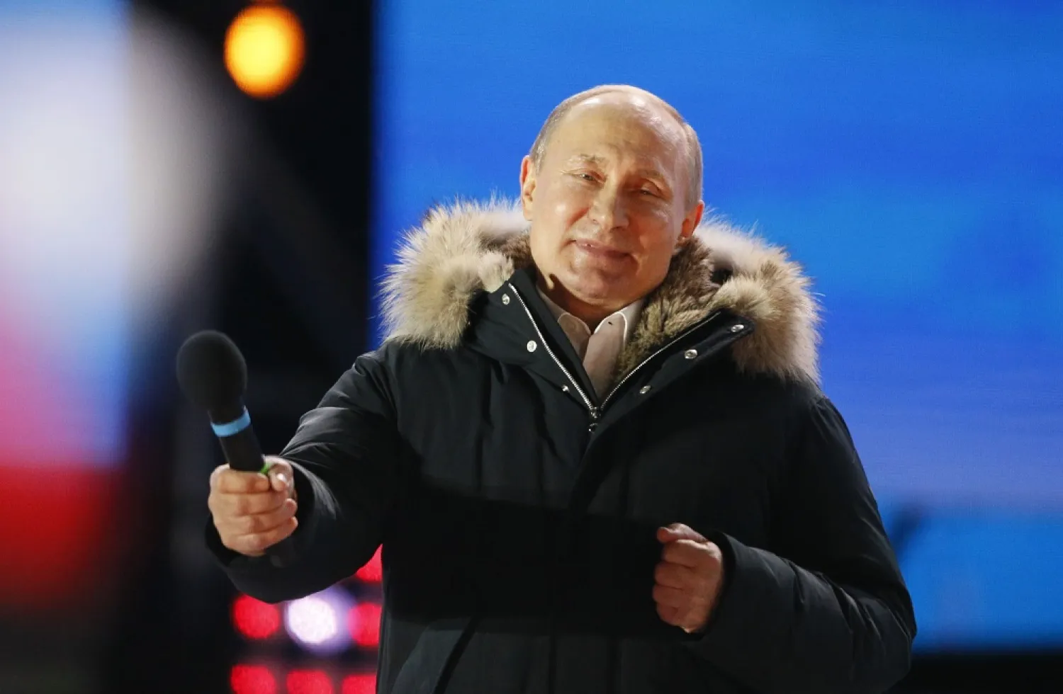 Russian President Vladimir Putin delivers a speech during a rally marking the fourth anniversary of Russia's annexation of Crimea, at Manezh Square in Moscow, March 19, 2018. (Reuters)