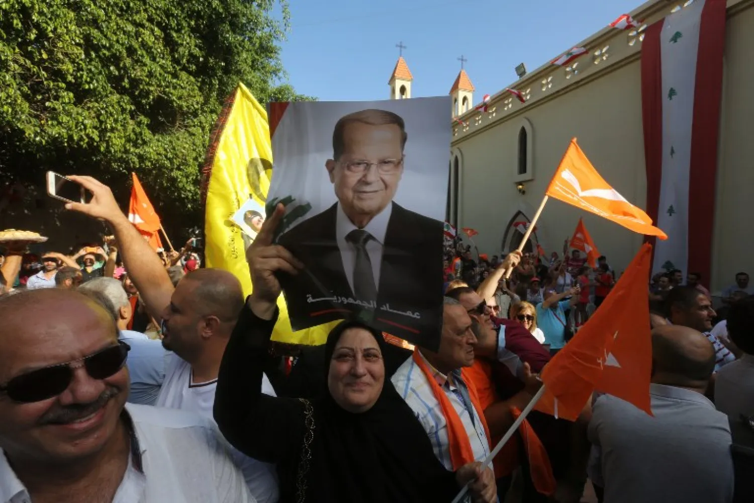 Supporters of Lebanon’s Free Patriotic Movement celebrate the election of their leader Michel Aoun in the town of Jdeideh, north of Beirut, on October 31, 2016. (AFP PHOTO/MARWAN TAHTAH)