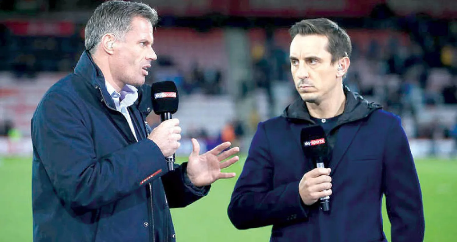 كاراغر (يمين) في آخر ظهور له مع نيفيل قبل إيقافه