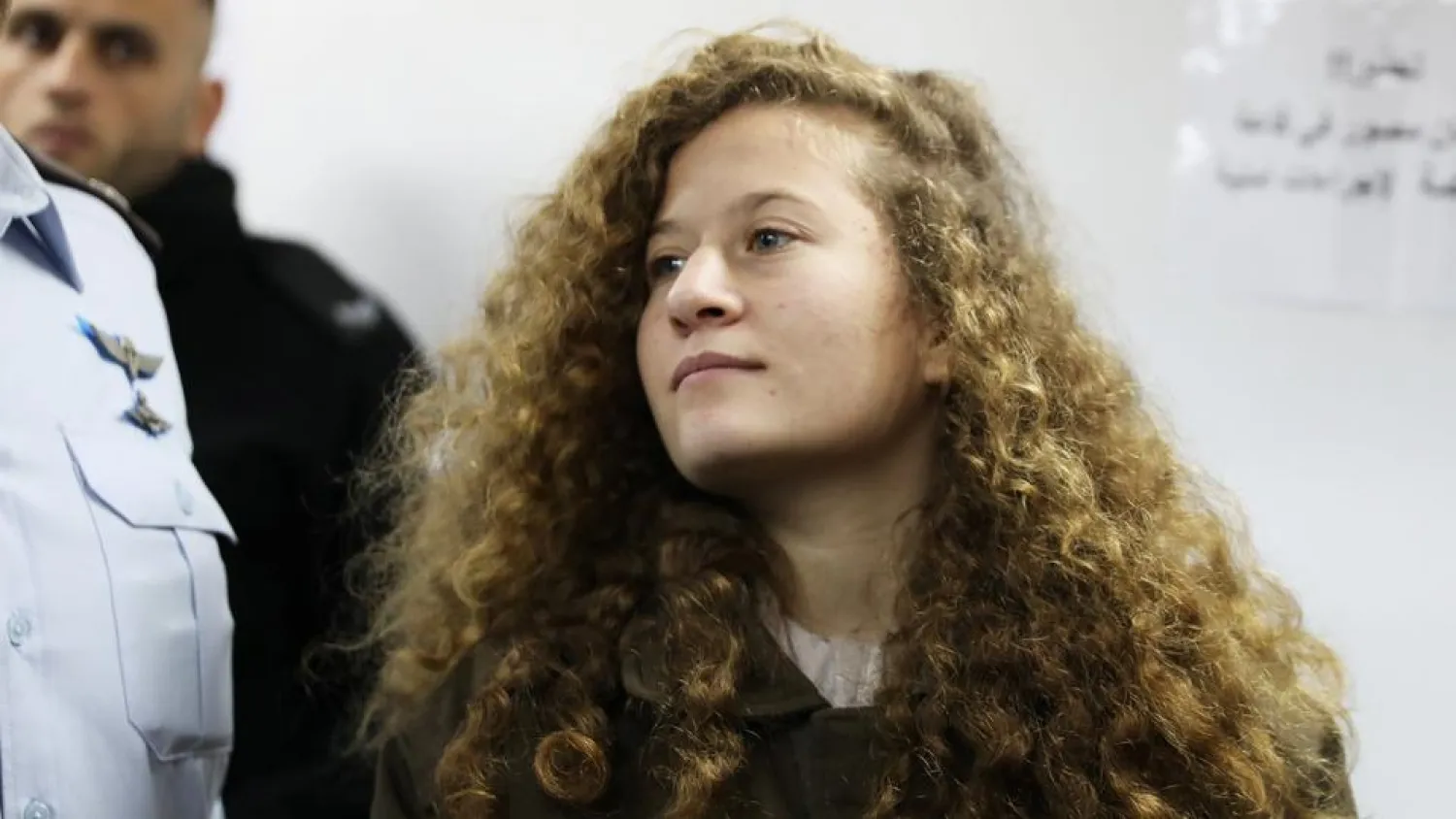 Palestinian teen Ahed Tamimi enters a military courtroom at Ofer Prison, near the West Bank city of Ramallah. (Reuters)
