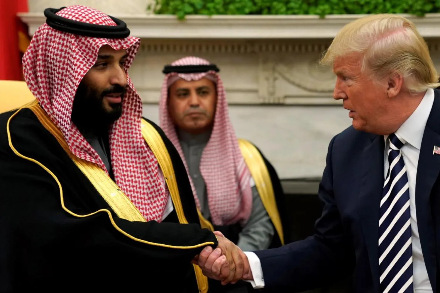  US President Donald Trump shakes hands with Saudi Arabia's Crown Prince Mohammed bin Salman in the Oval Office at the White House in Washington, US March 20, 2018. REUTERS/Jonathan Ernst