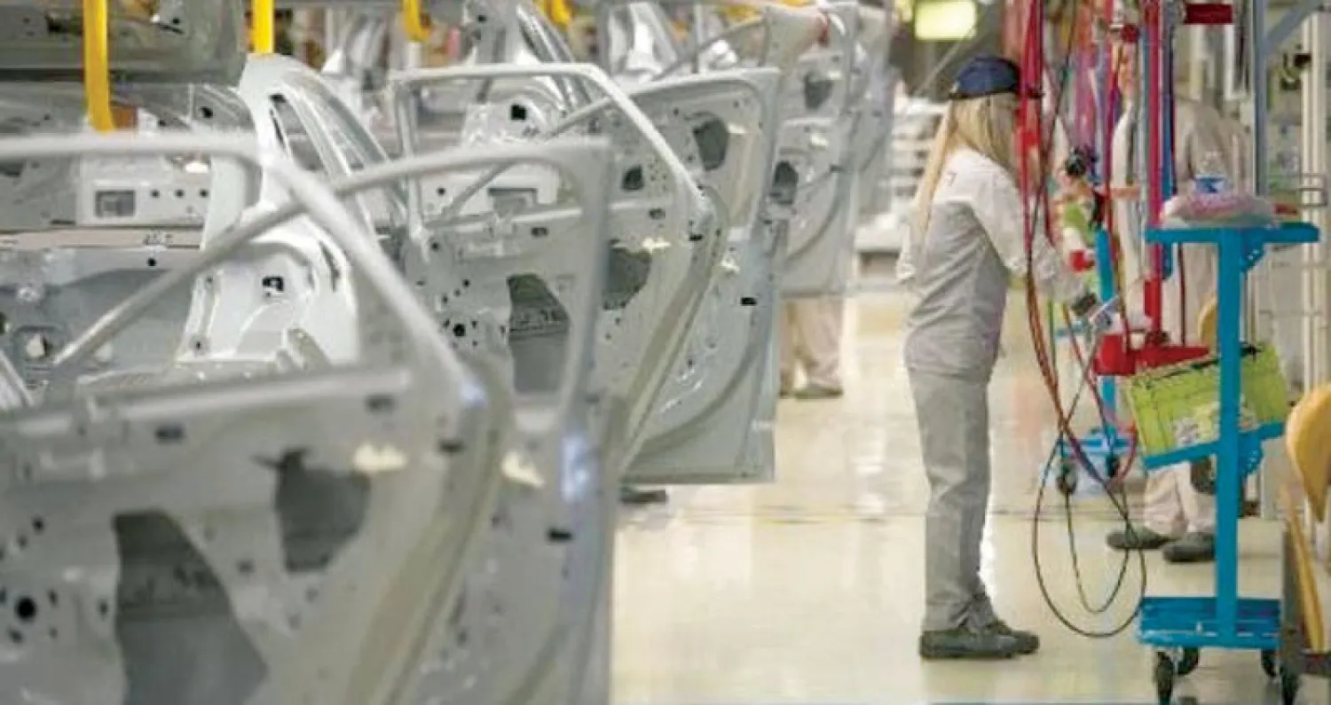 عاملة بأحد مصانع السيارات في المغرب (أ.ف.ب)