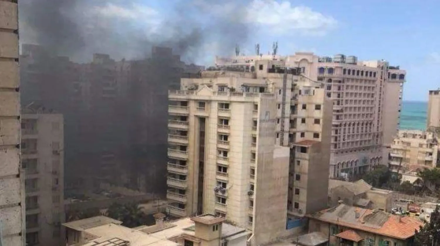 Smoke billows from the site of the explosion in Alexandria. (Twitter)