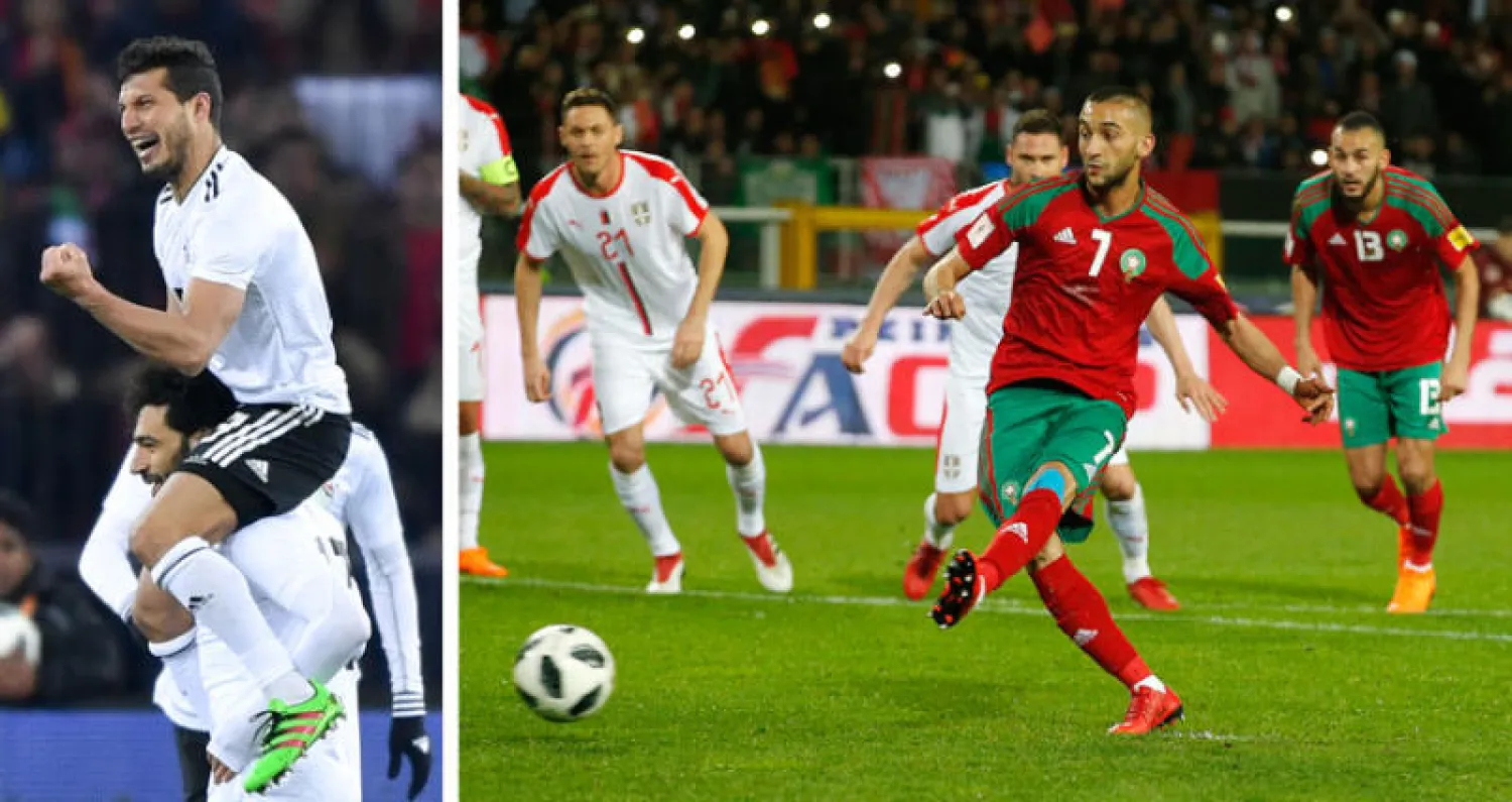 حكيم زياش  يتقدم للمنتخب المغربي من ركلة جزاء (أ.ب)  -  صلاح وحامد يحتفلان بهدف مصر (أ.ف.ب)