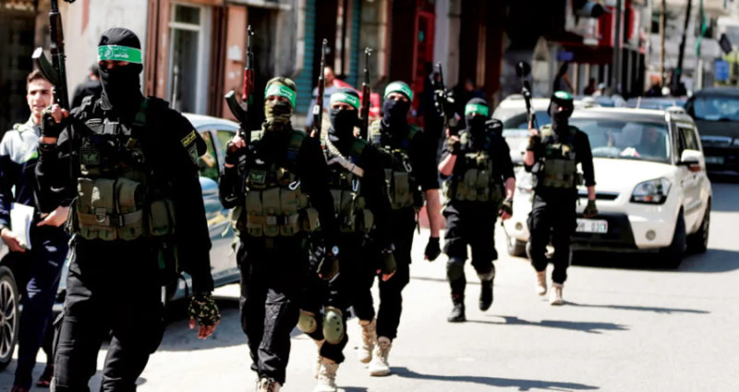 عناصر من {كتائب القسام} خلال مناورة في مدينة غزة (أ.ف.ب)