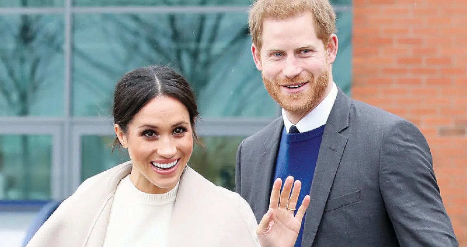 الأمير هاري وميغان ماركل بعد زيارة لحديقة العلوم  في بلفاست (رويترز)