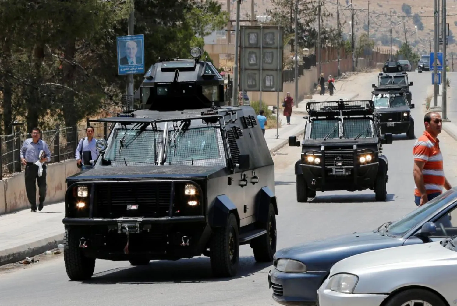 Jordanian security vehicles seen near the General Intelligence directorate offices, north of Amman, Jordan, June 6, 2016. Reuters.