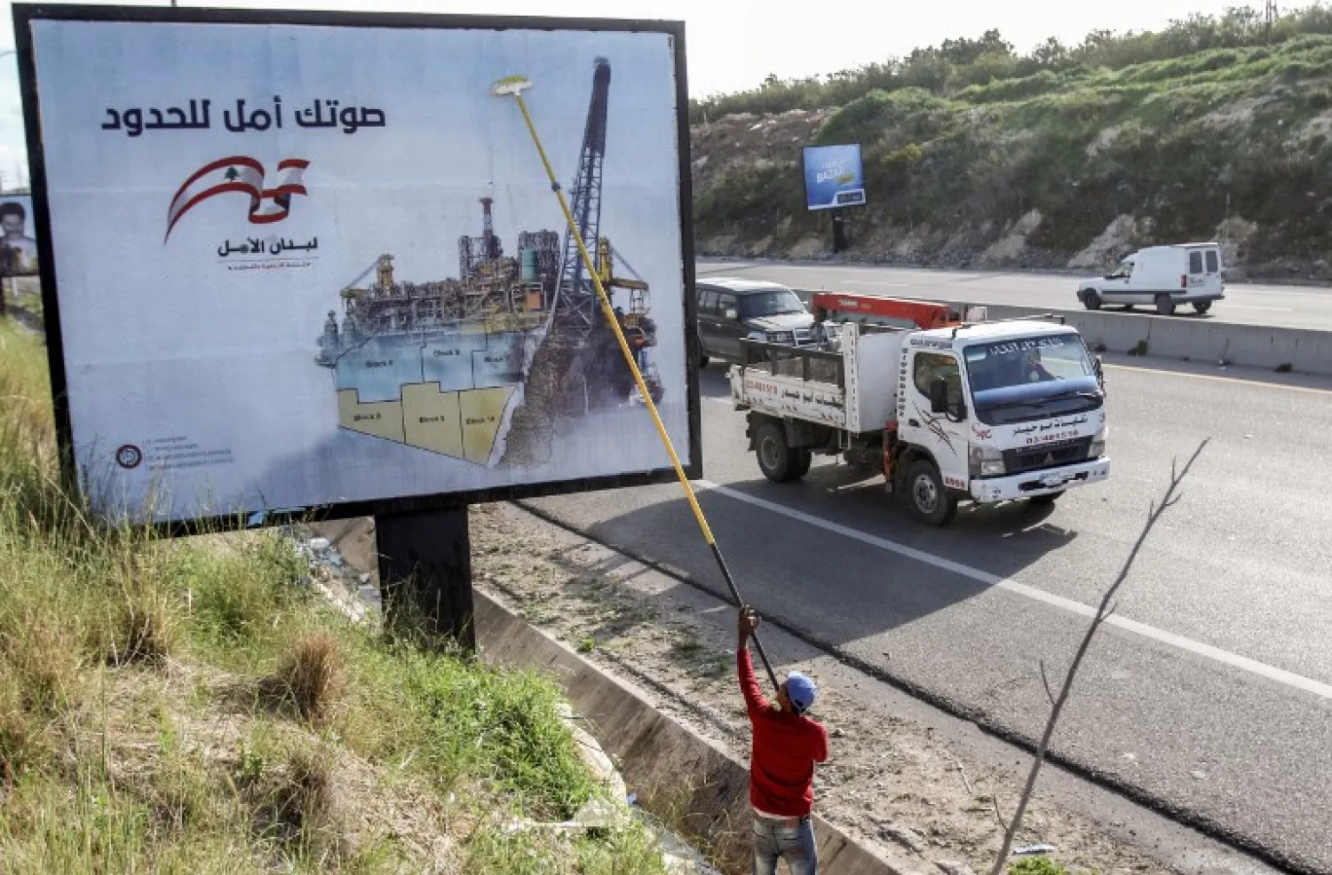 A picture taken on March 9, 2018 along a highway in the southern Lebanese coastal city of Tyre shows electoral billboards for the upcoming 2018 May parliamentary elections in Lebanon by Amal movement. Mahmoud ZAYYAT / AFP