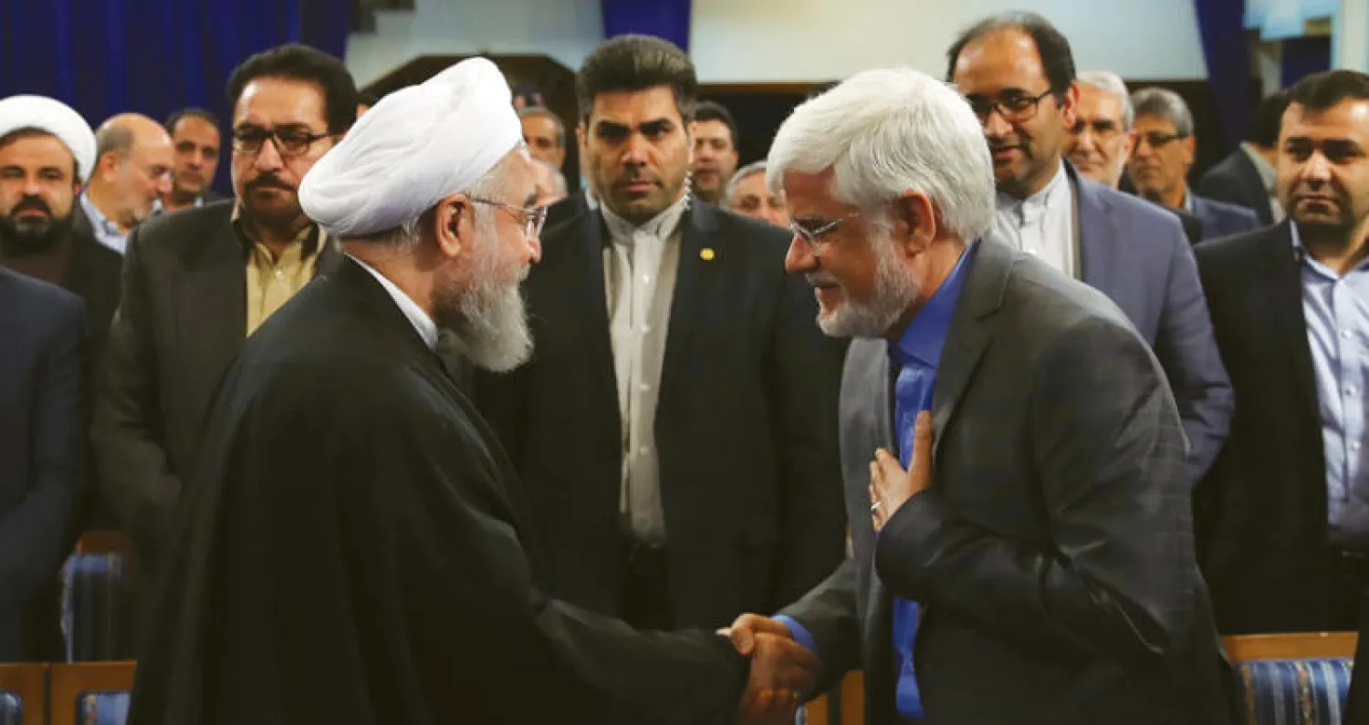 روحاني ورئيس {كتلة الأمل} الإصلاحية محمد رضا عارف قبيل إعلانه الترشح العام الماضي 2017 (موقع روحاني)