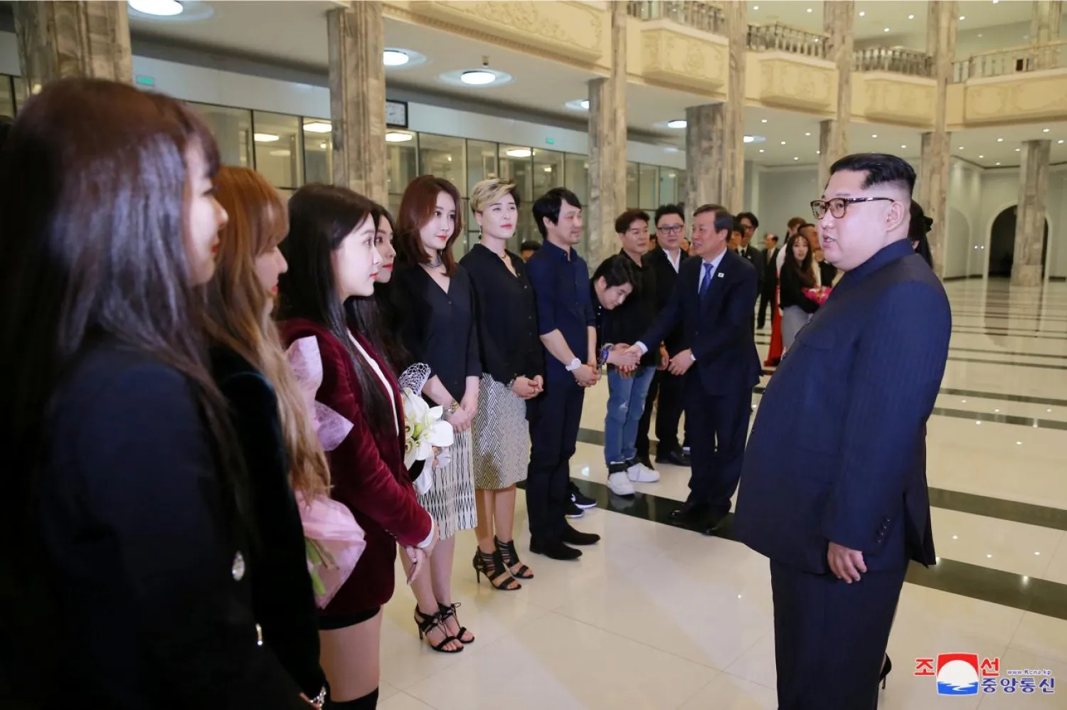 North Korean leader Kim Jong Un meets South Korean K-pop singers in this photo released by North Korea's Korean Central News Agency (KCNA) in Pyongyang April 2, 2018. (Reuters)