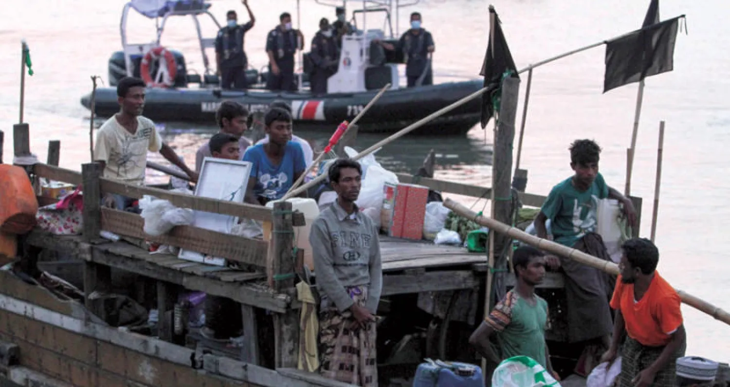 قوارب تحمل 56 من الروهينغا تصل إلى جزيرة لانكاوي الماليزية (أ.ف.ب)