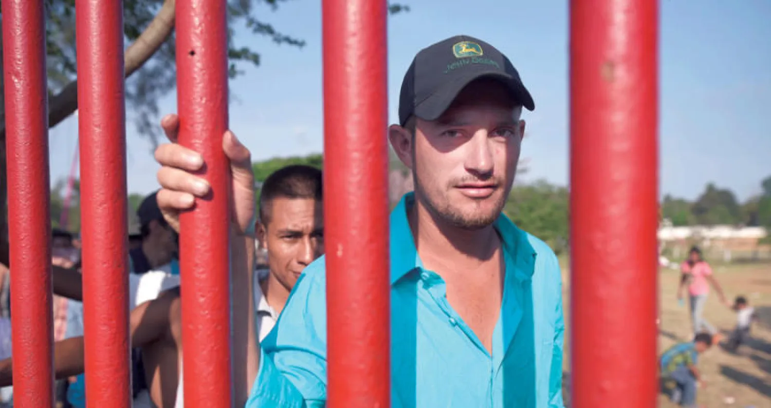 مهاجرون مشاركون في «القافلة» في مخيم مؤقت بواهاكا المكسيكية (أ.ف.ب)