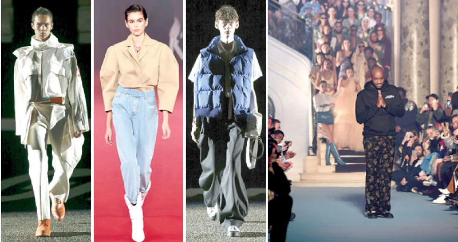 المصمم فرجيل أبلو يحيي ضيوفه بعد انتهاء عرض داره «أوف وايت» في باريس مؤخراً  -  من خطه الرجالي الخاص