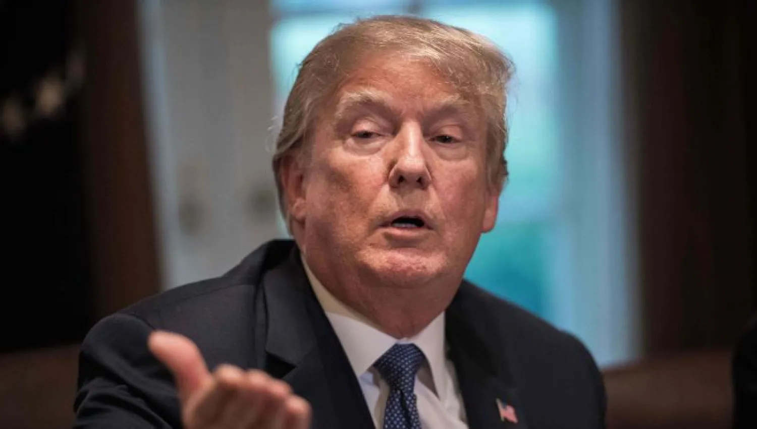 الرئيس الأميركي دونالد ترمب خلال اللقاء أمس (أ.ف.ب)