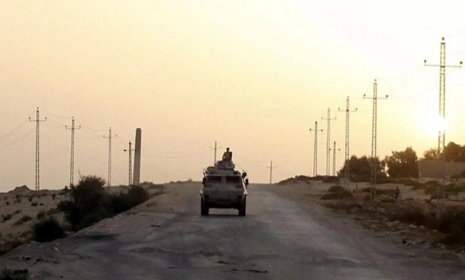 An Egyptian military vehicle is seen on the highway in northern Sinai, Egypt, in this May 25, 2015 file photo. REUTERS/Asmaa Waguih/Files
