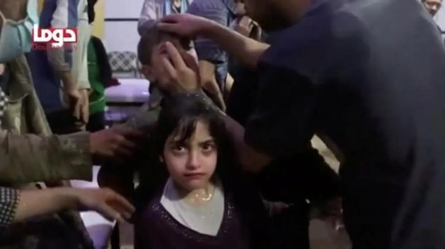 الفتاة ماسا خلال الهجوم الكيماوي على دوما (رويترز)