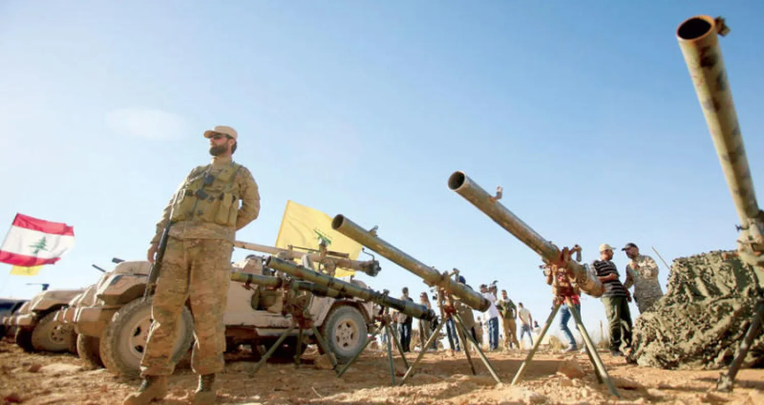 مقاتلو «حزب الله» في جرود عرسال قرب الحدود السورية العام الماضي  (رويترز)