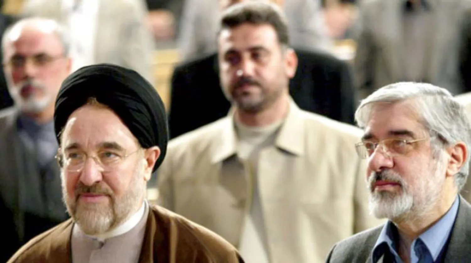 Reformist leader Mirhossein Mousavi and former President Mohammad Khatami months before the 2009 presidential election (AFP)