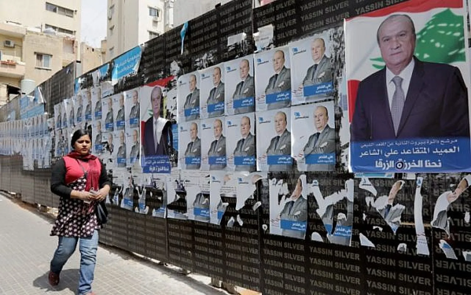 A picture taken on April 3, 2018 shows campaign posters, for the upcoming Lebanese parliamentary election, hanging in the Tariq Jedideh district of Beirut. (AFP Photo/Anwar Amro)