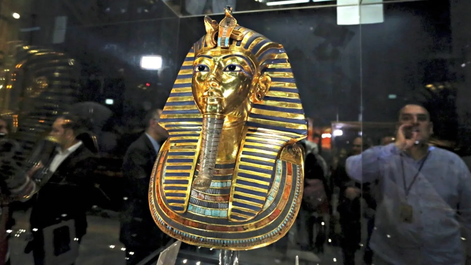 The golden mask of King Tutankhamun is displayed inside a glass cabinet at the Egyptian Museum in Cairo. (Reuters)