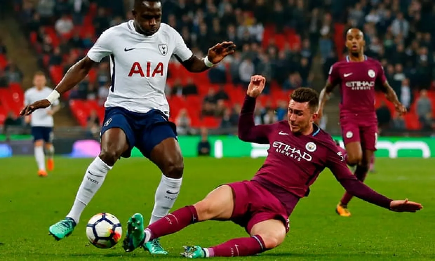  Manchester City’s Aymeric Laporte tackles his French compatriot Moussa Sissoko – Laporte is City’s record signing. Photograph: Ian Kington/AFP/Getty Images
