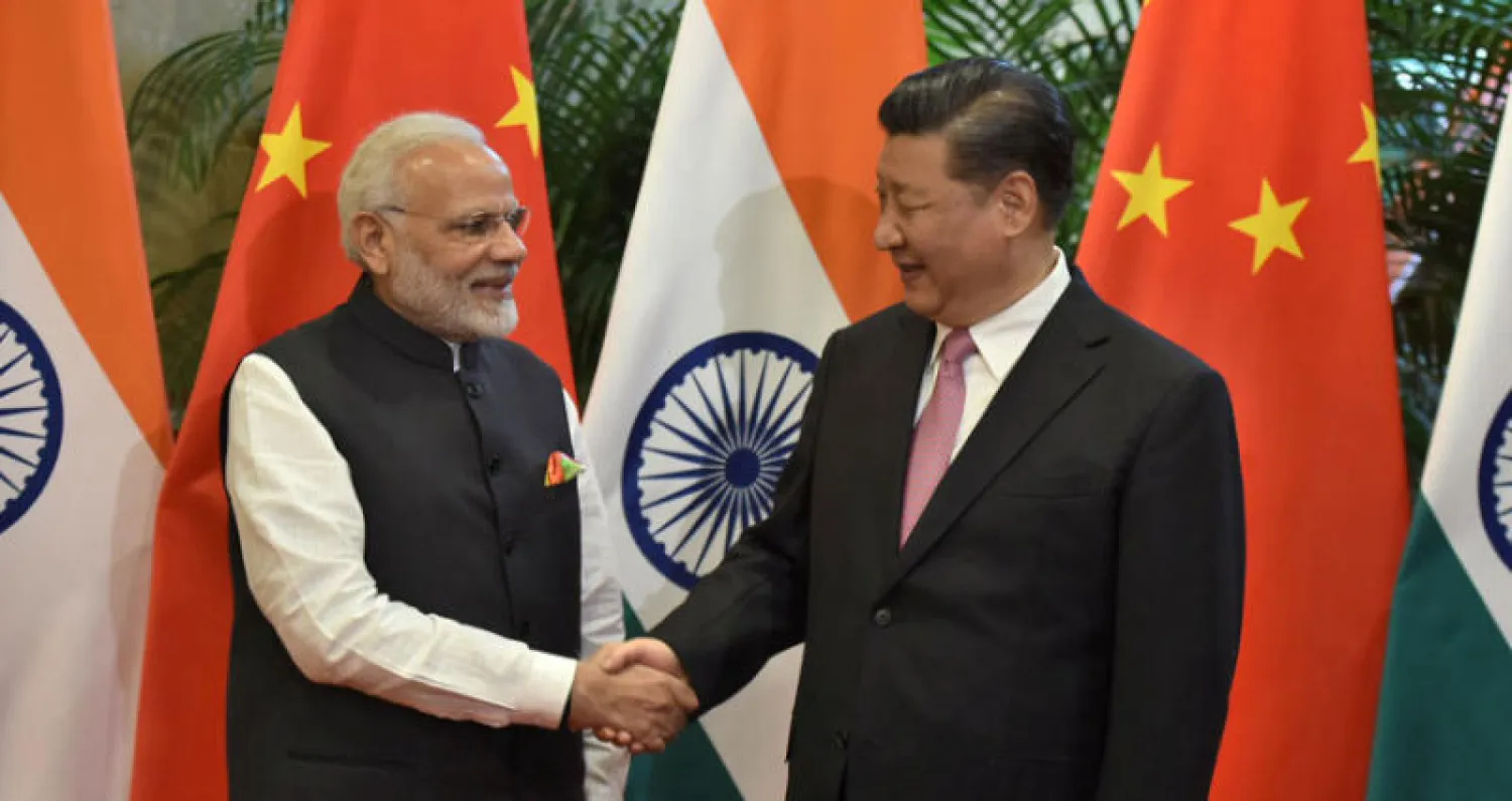 الرئيس الصيني شي جينبينغ و رئيس الوزراء الهندي ناريندرا مودي.