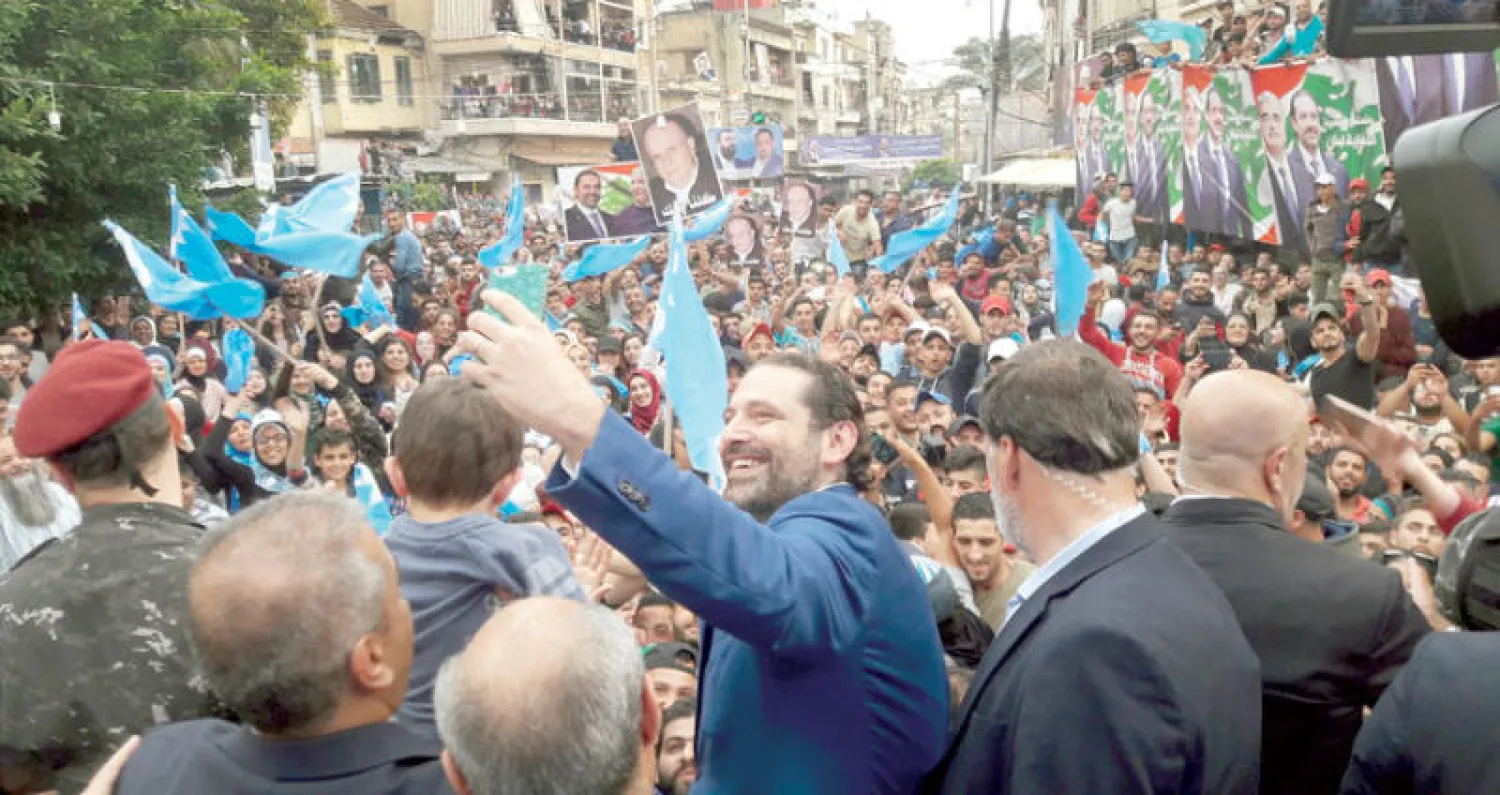 الرئيس سعد الحريري خلال جولة انتخابية في طرابلس (رويترز)